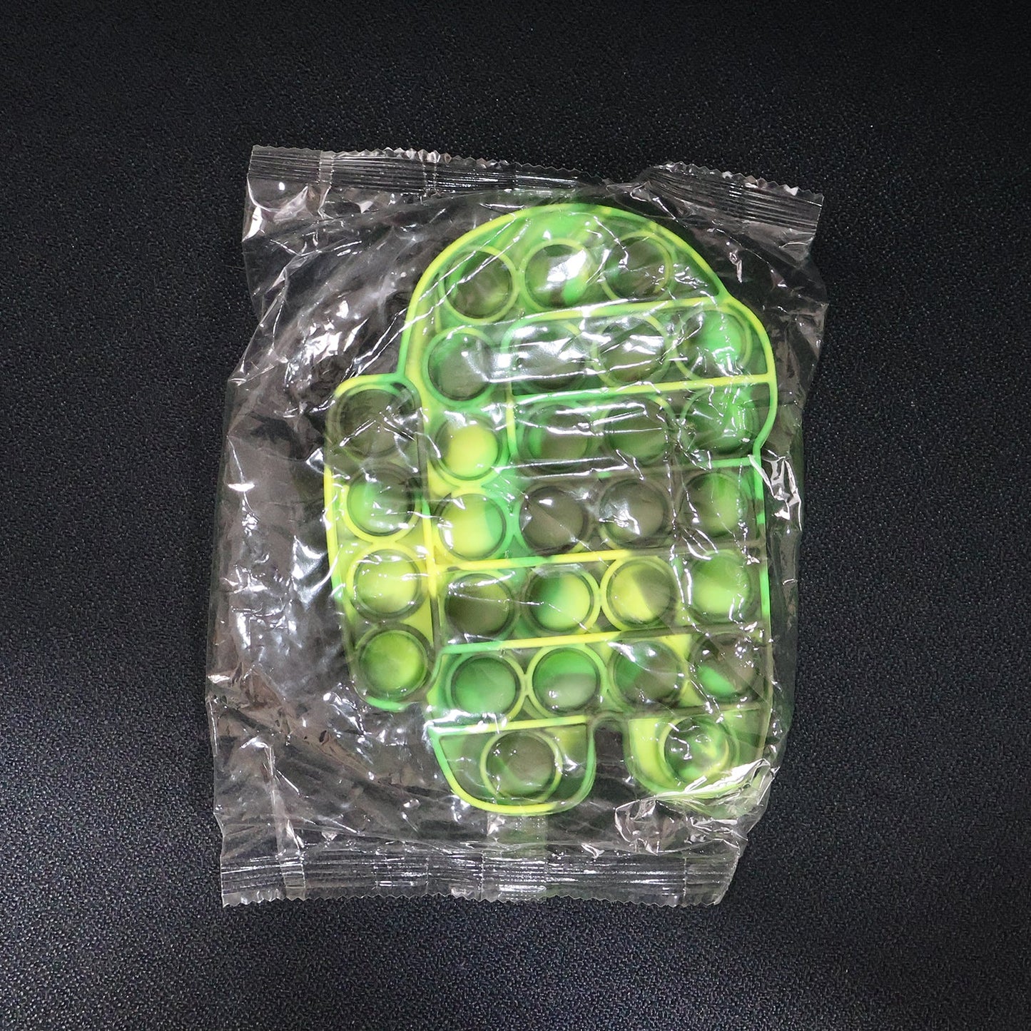 Astronaut silicone Pop It fidget toy displayed on neutral background