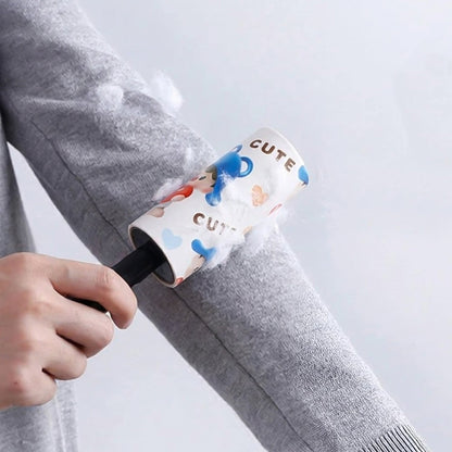 Dust remover lint roller cleaning pet hair from a fabric sofa