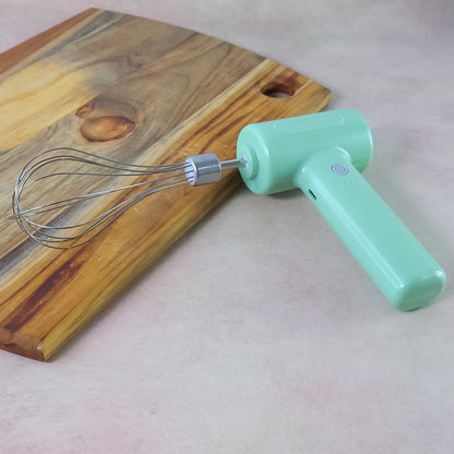 Cordless Electric Whisk connected for USB charging, with clear LED indicators.