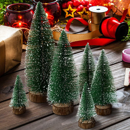 Compact snow effect Christmas tree with sturdy wooden base perfect for holiday decor