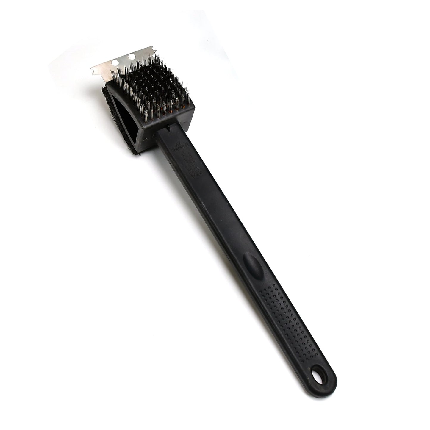 Black silicone toilet brush with its draining holder, ready for use in a modern bathroom.