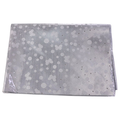 Premium quality silver gift wrapping paper sheets stacked neatly
