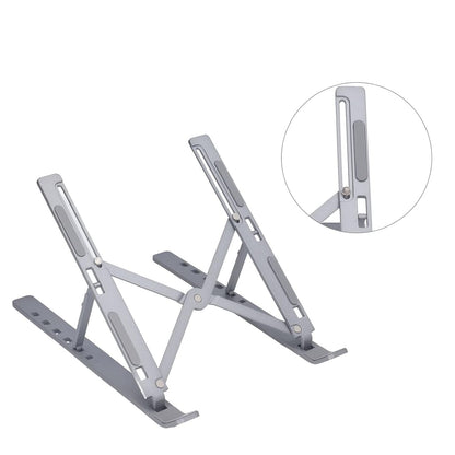 The metal portable laptop stand holds a laptop at an optimized height for comfortable viewing.