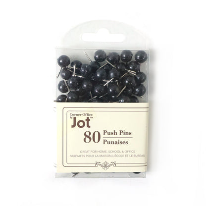 Close-up of strong hold round head push pins on cork board