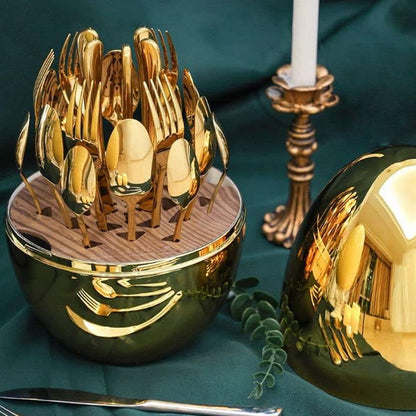 Complete golden cutlery set gracefully displayed on a sophisticated table setting.