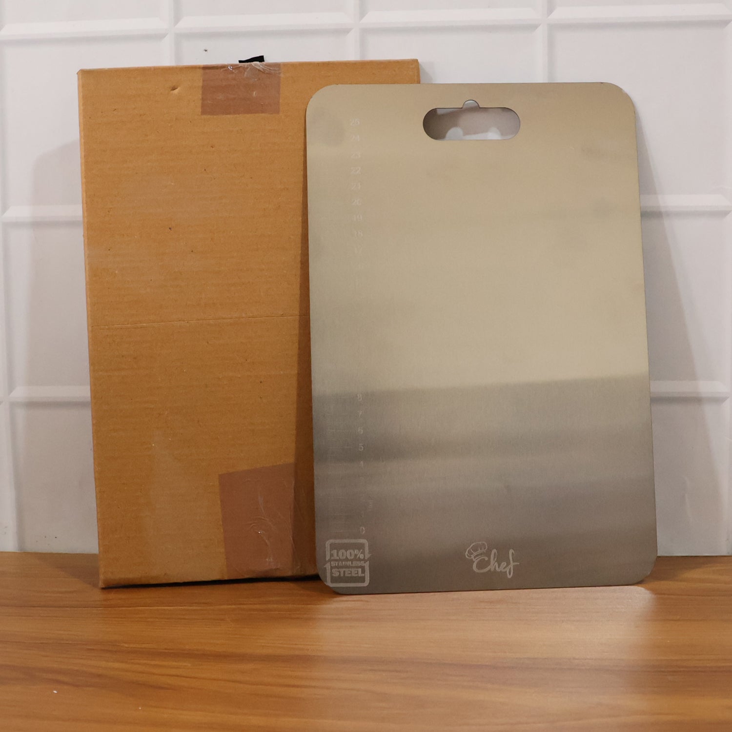 Versatile stainless steel cutting board for meat and vegetables
