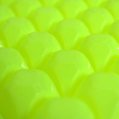 A stream of water filling the easy release ice tray cavities.