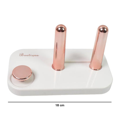 Bathroom space organized with wall-mounted hair dryer holder