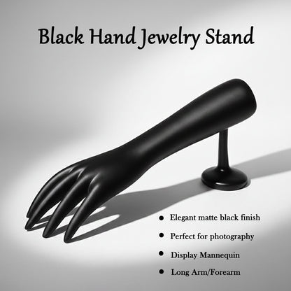 Palm side of black hand-shaped jewelry organizer stand