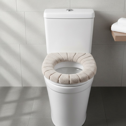 Plush Toilet Seat Cover in a serene white bathroom setting, offering warmth and comfort.