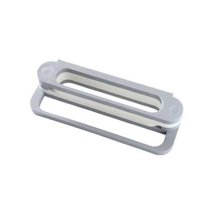 Side view of the versatile folding shoe rack, also used to hang towels.