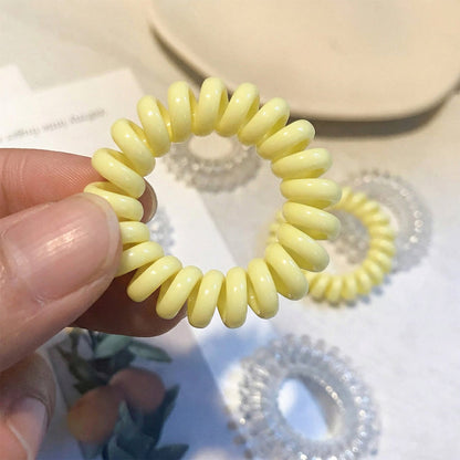 Close-up of spiral hair rubber band showing flexible design