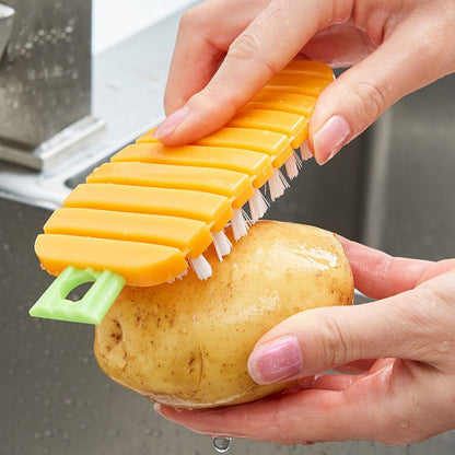Retail packaging for the Claranza carrot-shaped vegetable scrubbing brush.