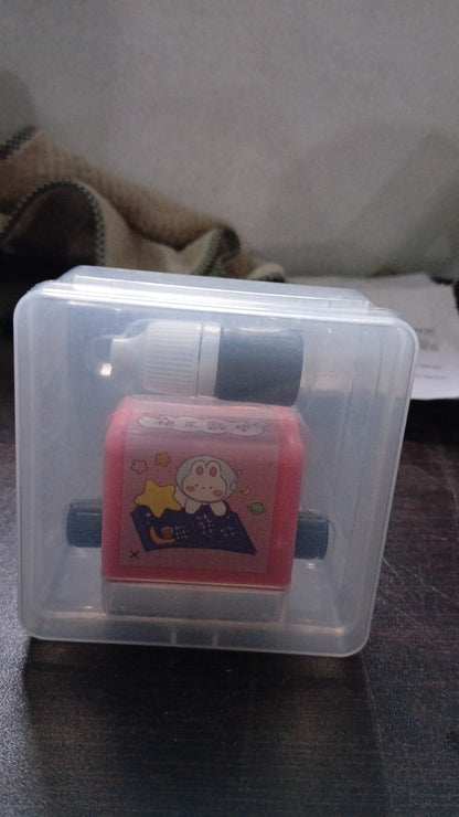 Portable addition and subtraction roller stamp for on-the-go math practice.