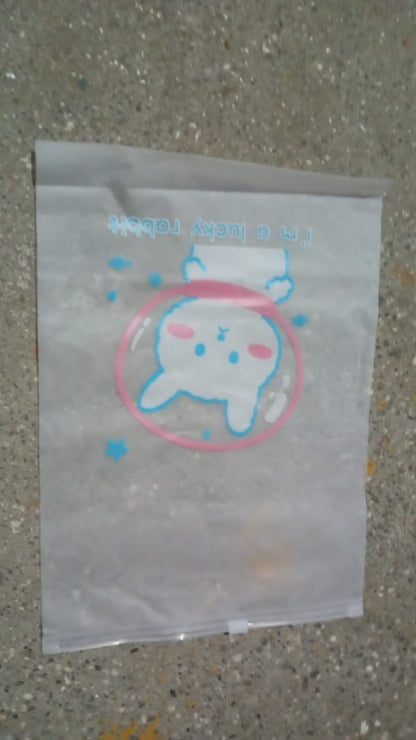 Reusable zip pouch filled with cosmetics, demonstrating its utility as a makeup bag.