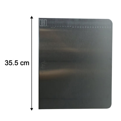 Measurement scale on stainless steel chopping board showing size