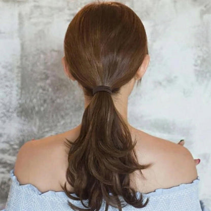 Close-up of rubber bands and hair clips
