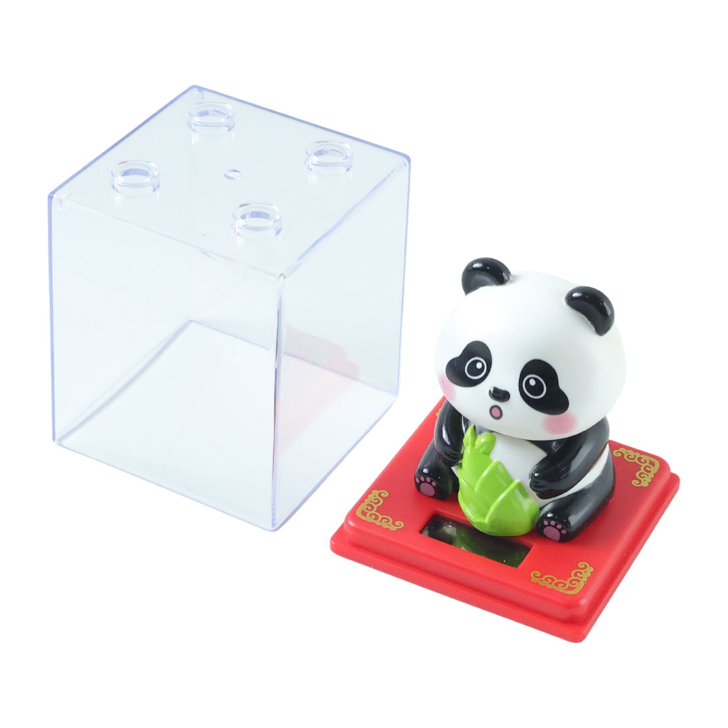 Car dashboard panda decoration showing solar energy panel