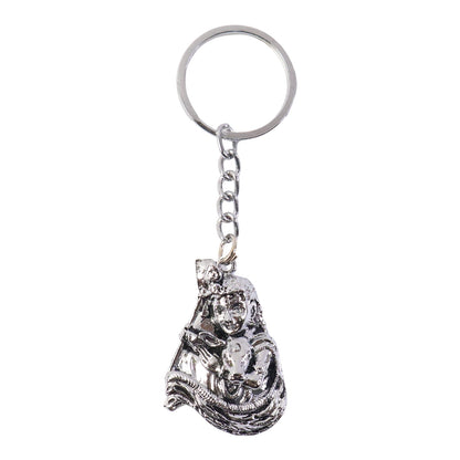 Front view of silver finish Bal Krishna metal keychain highlighting ornate details