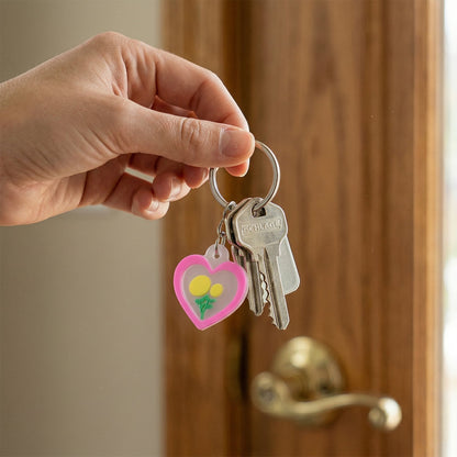 Heart-shaped and floral bag charms for everyday use