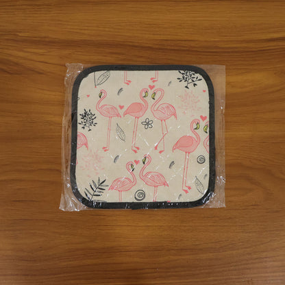 Printed heat resistant kitchen pot holder mat actively used in kitchen