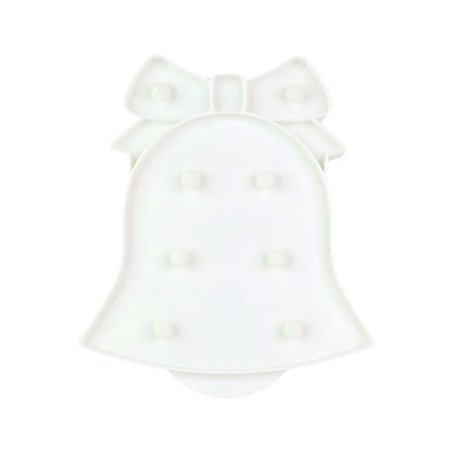 Battery operated LED Bell Shaped Night Light placed on bedside table