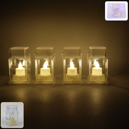 Set of 4 LED flameless lantern style decorative candles creating warm glow
