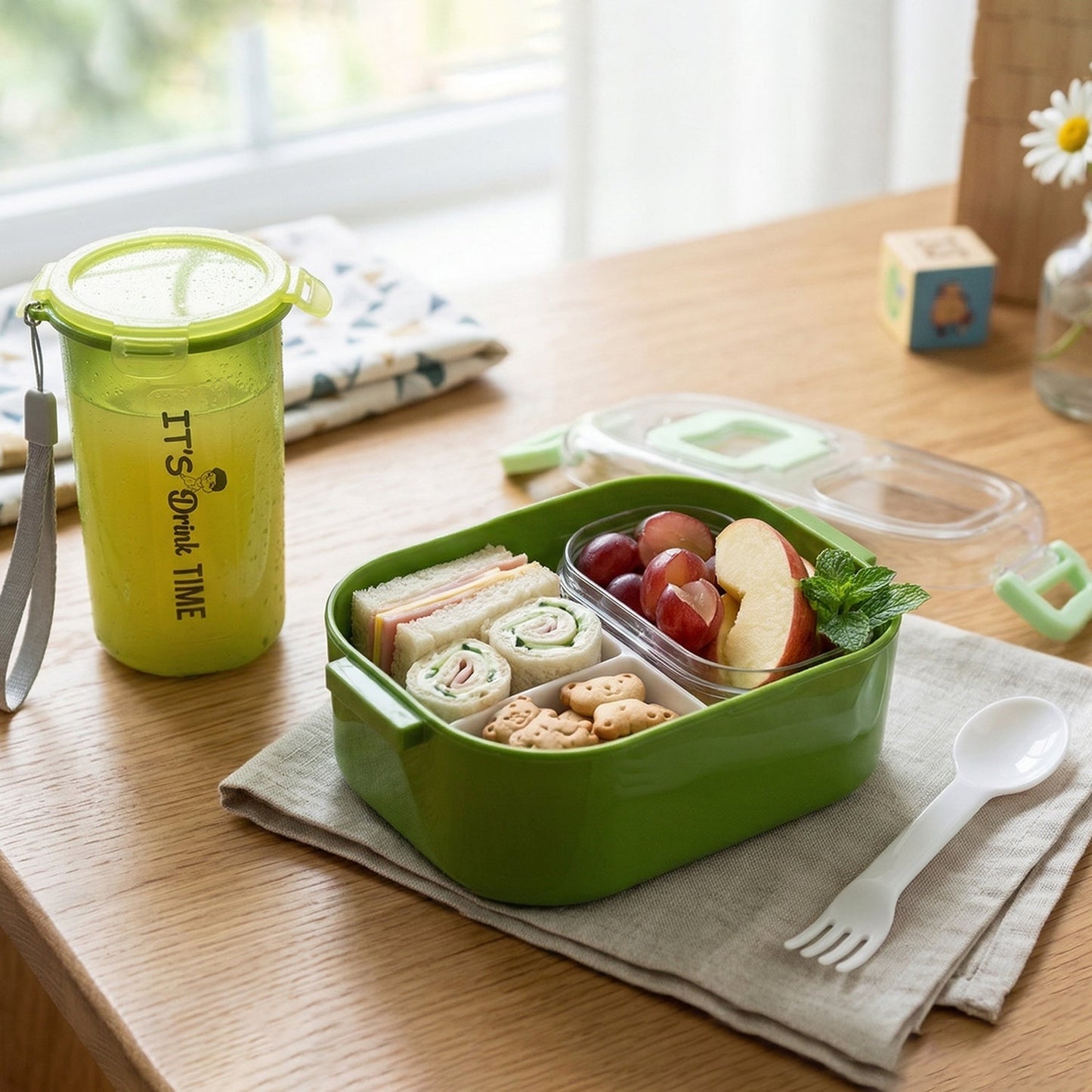 Open purple lunch box revealing multiple compartments for organised food storage.