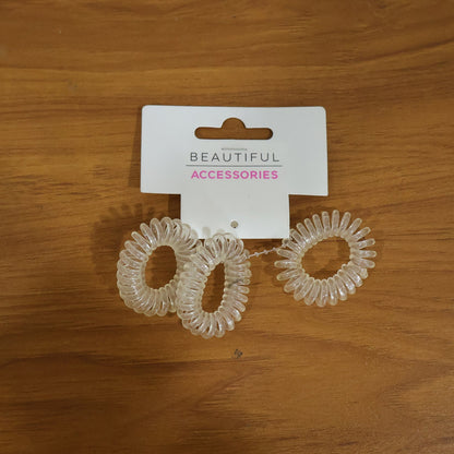 Stylish transparent spiral coil hair ties for everyday use