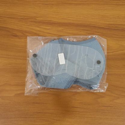 Model wearing reusable face mask with clear eye shield for safety
