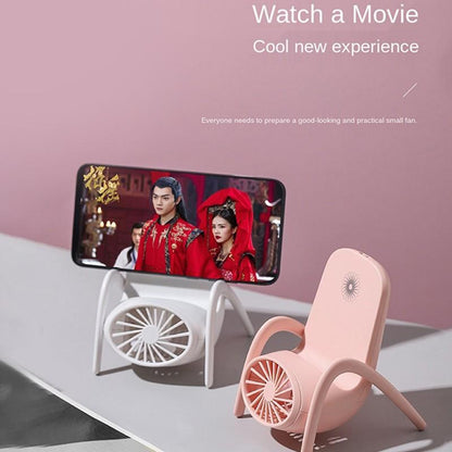 Portable Phone Holder Fan holding a smartphone, ideal for hands-free viewing.