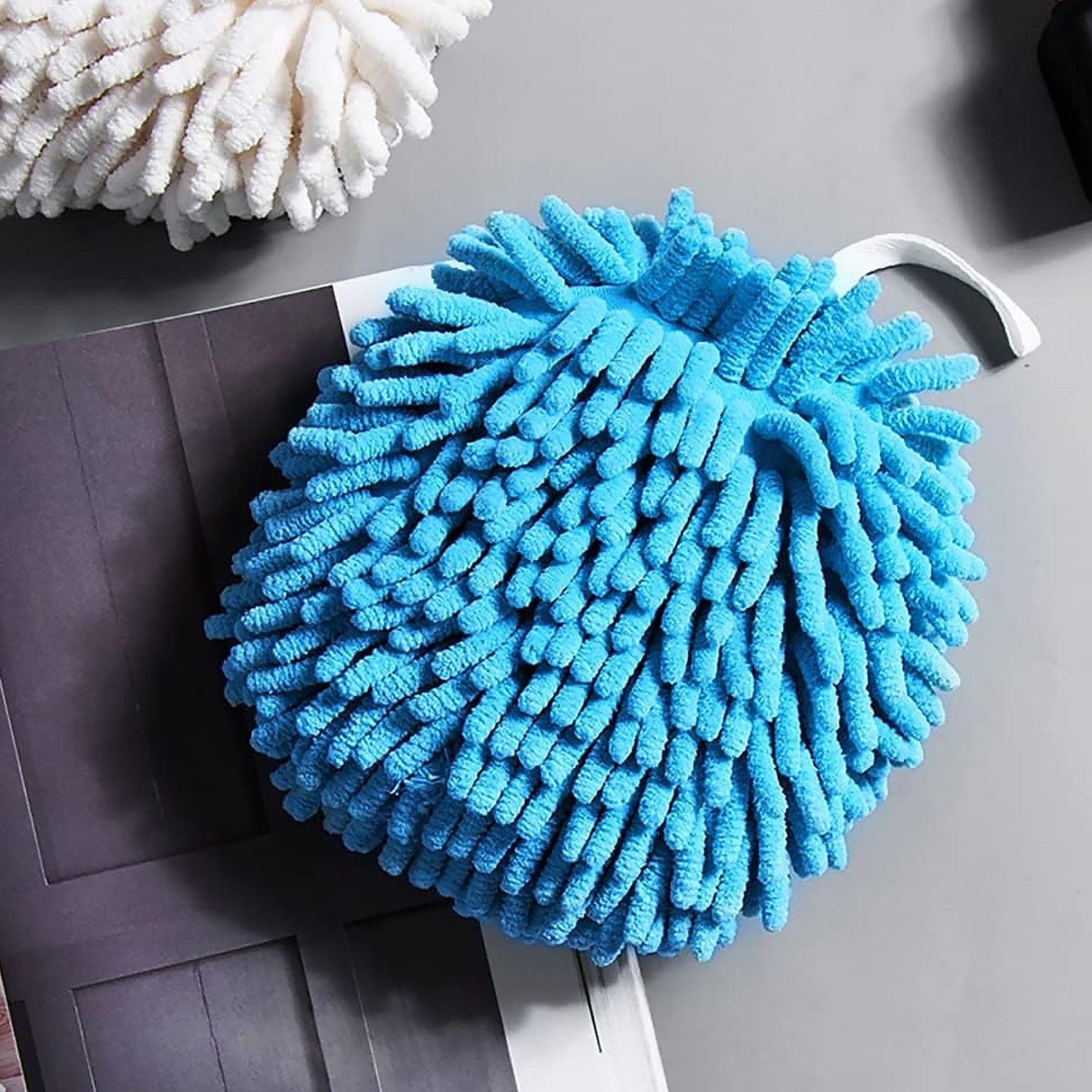 Microfiber duster mitt showing comfortable hand fit