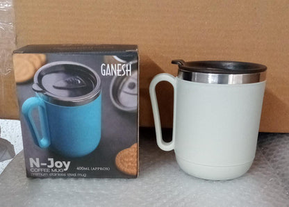 The Ganesh brand logo prominently displayed on the premium stainless steel coffee mug.