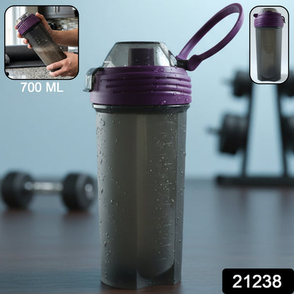 Clear plastic protein shaker bottle with secure flip lid